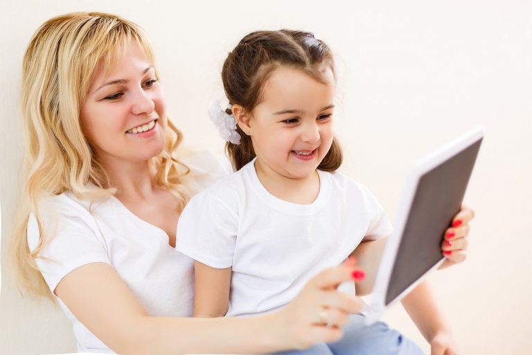 A daughter and mother learning with educational technology