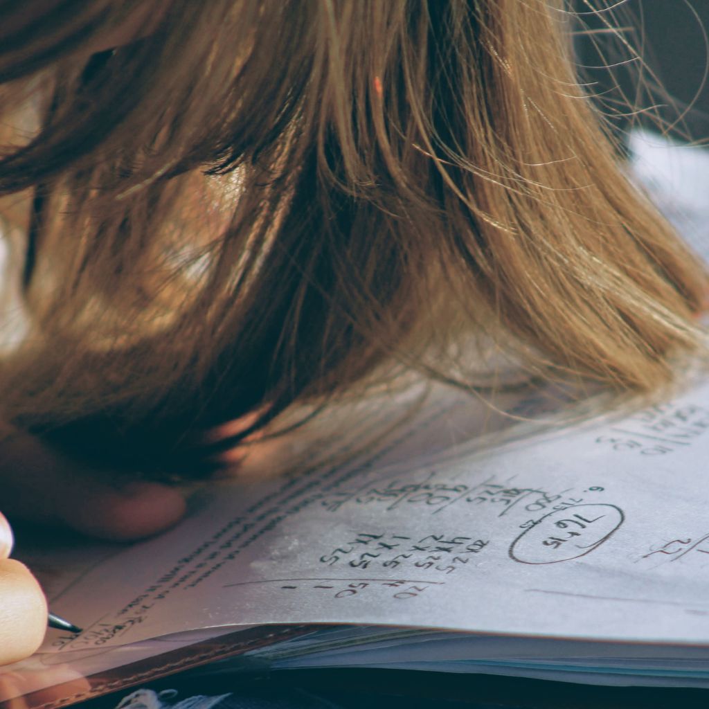 A child learning the fundamentals of maths for their future job